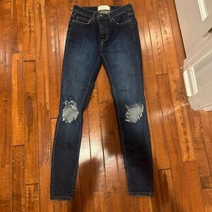 Free People Dark Denim Skinny jeans with rip at knee